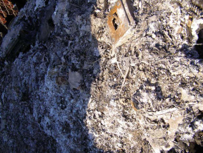 Photograph 10: MED components fused together in molten metal (Lancaster, TX).