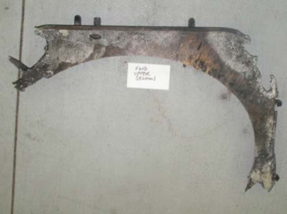 Photograph 23: Right side #1 after accident (left)