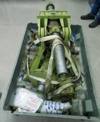 Figure 6: Container cover removed, opposite end (left)