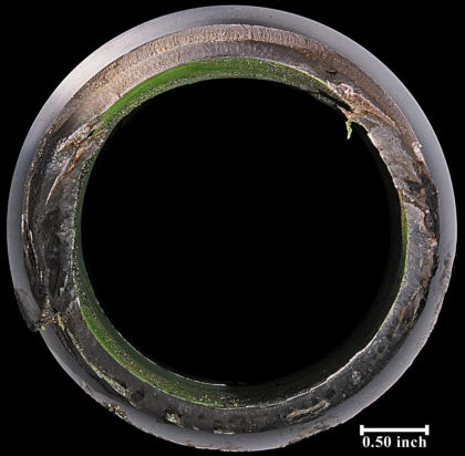 Figure 3. Images of the fracture surface of the mating half after cleaning. An origin can been seen on the OD at the root of a thread in the top of the images. (2 of 4)
