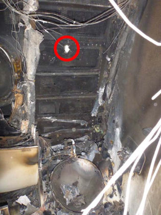 Photo 19. Interior view of Snozzle penetration hole in 2R lavatory.