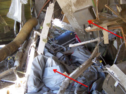 Photo 43. Forward-facing view of jumpseat M4A and 4L slide/raft. (1 of 3)