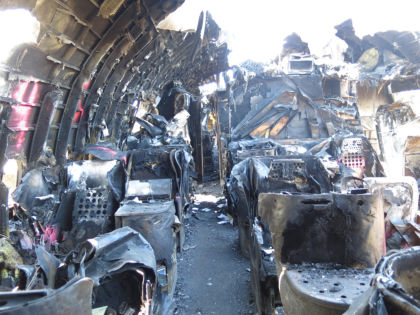 Photo 81. Aft-facing view of A-zone from right aisle near row 3.