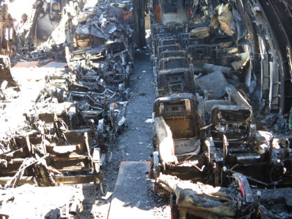 Photo 87. Forward-facing view of B-Zone from right aisle after debris removal.
