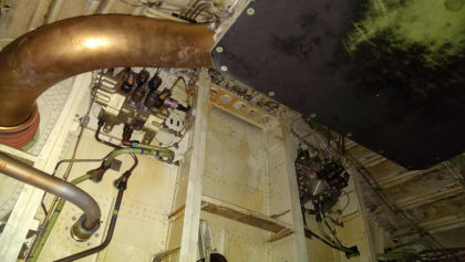 Photos - On-scene photos of lower fuselage skin and aft pressure bulkhead damage — page 4 of 14