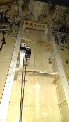 Photos - On-scene photos of lower fuselage skin and aft pressure bulkhead damage — page 6 of 14