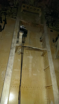 Photos - On-scene photos of lower fuselage skin and aft pressure bulkhead damage — page 7 of 14