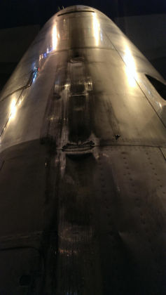 Photos - On-scene photos of lower fuselage skin and aft pressure bulkhead damage — page 14 of 14