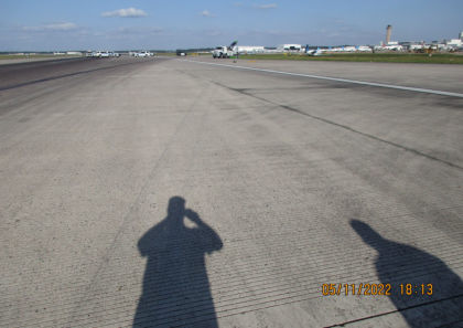 Photograph 1 – View of Runway Marks and Airplane at Rest (Courtesy FAA)