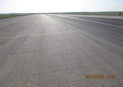 Photograph 3 – View of Runway Marks Looking Back (Courtesy FAA)