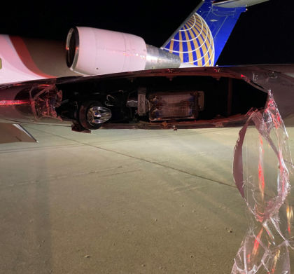 Photograph 7 – View of Minor Damage to Left Wing Tip (Courtesy Air Wisconsin)
