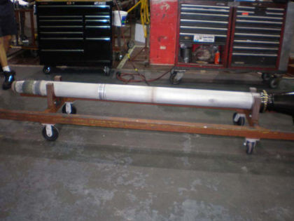 Photo 22: LPT shaft showing various circumferential rub marks There were five randomly located 3rd stage turbine blades that were fractured between 1 7/8- and 3 1/4-inches above the blade root platform. (Refer to Photo 23.) The ends of four