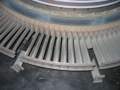 Photo 23: 3rd stage turbine blades showing random broken blades (Boeing)
