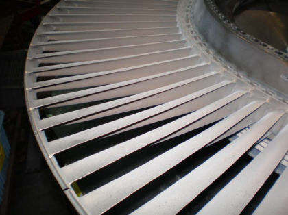 Photo 24: 4th stage turbine blades showing impact marks on airfoils