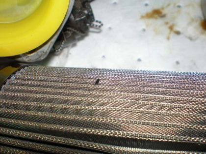 Photo 27: Debris in oil filter screen
