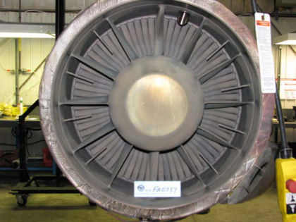 Figure 5. ESN FA0737, exhaust There was an approximately 4.5-inch circumferential by 3.5-inch axial hole through the gas generator case (GGC) and insulation blanket between 6 and 7 o’clock3 and roughly in line with the diffuser pipe exit po