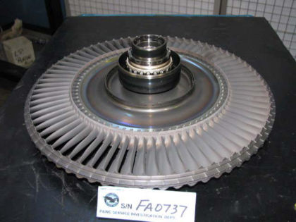 Figure 16. Forward side of PT1 disk assembly, showing 6.5 bearing and carbon seal runner The inter-stage turbine vane ring was intact. See Figure 17.