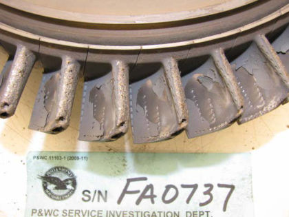 Figure 18. HPT blades The HPT vane ring assembly showed no mechanical damage. There was a bluish discoloration on the vane trailing edges between 7 and 12 o’clock; the remaining TEs were metal splattered. See