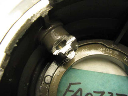 Figure 34. No. 1 bearing oil nozzle housing, showing circumferential scoring (right)