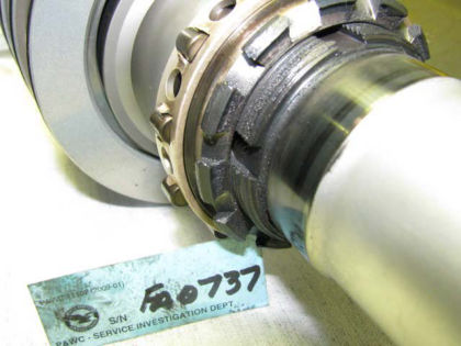 Figure 35. PT shaft and No. 2 bearing nut, key washer, and retaining ring, showing rotational damage