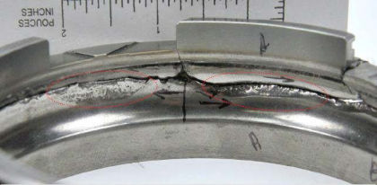 Figure 40. Regions of spalling on both sides of the axial crack