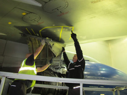 Figure 13. RH core cowl and wing damage