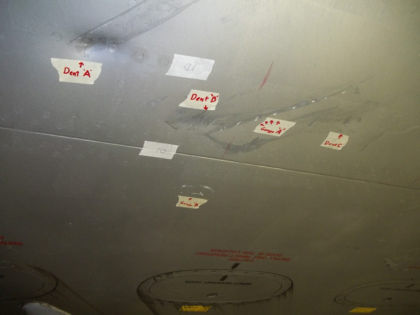 Figure 14. Damage to underside of left wing