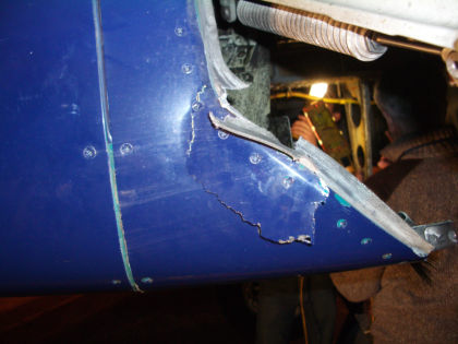Photo 3. Broken Piece of Belly Fairing