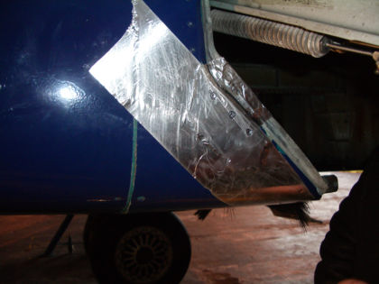 Photo 6. Speed Tape Over the Belly Fairing Tear