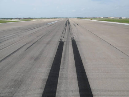 Photo 2 - Showing Marks on Runway from Both Right Main Landing Gear Tires