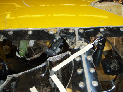 Photo 10. Reconstruction of canopy and windshield with broken center post.