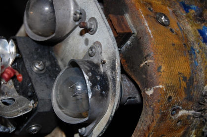 Figure 12 Pitting of nav light and damaged screw