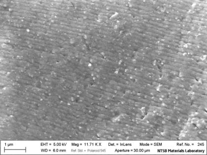 Figure 11. SEM micrograph of fatigue striations at the location indicated by the black arrow in Figure 4.